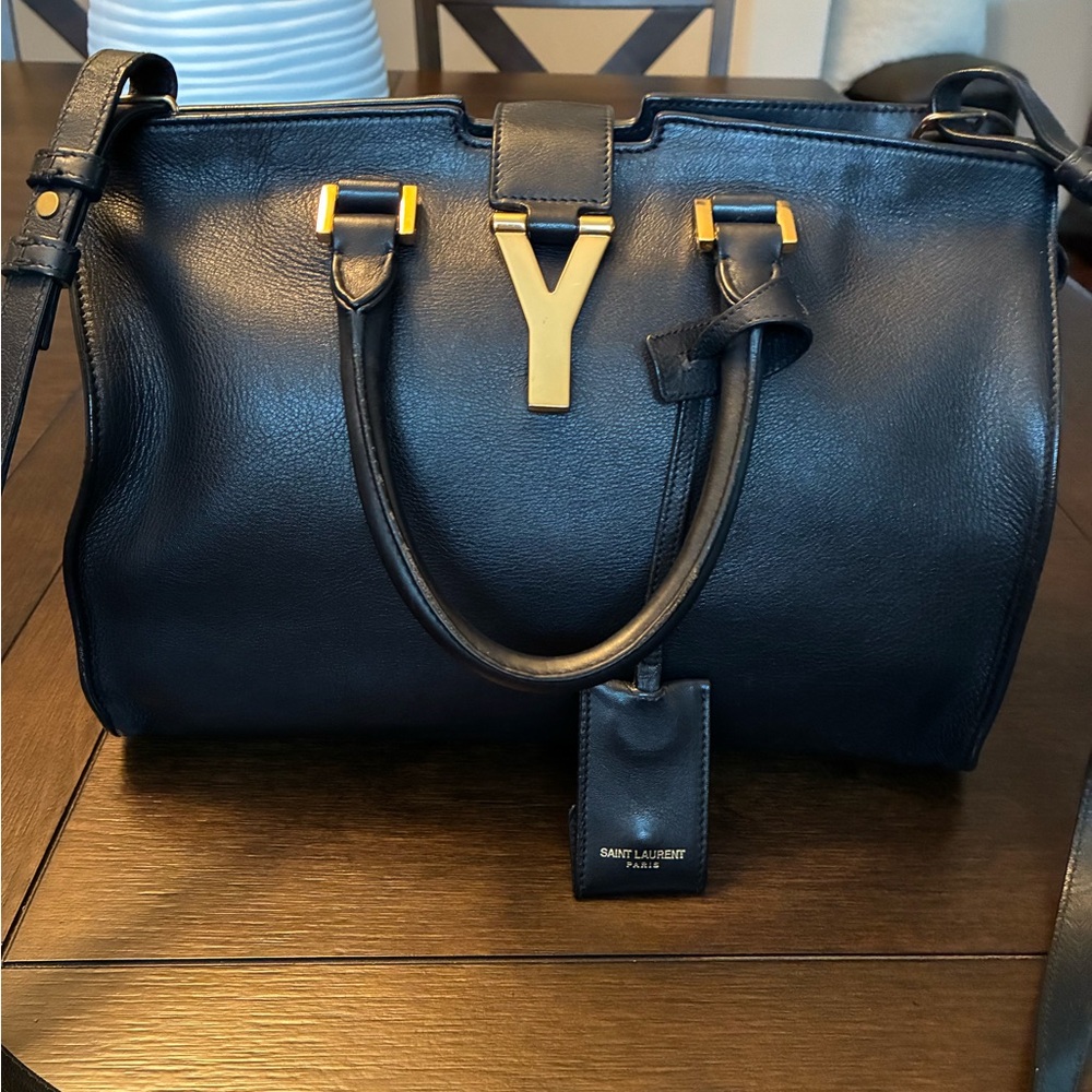Saint Laurent Black and Gold Satchel with Structured Design